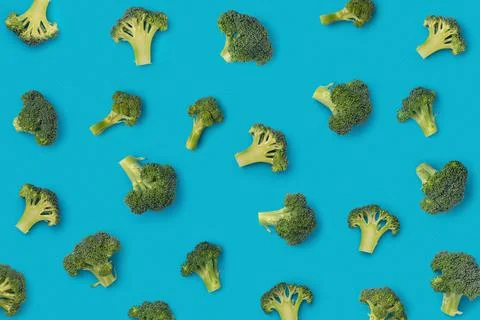 Pattern with broccoli on a blue background Stock Photos