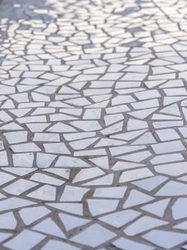Pattern of broken white tiles, mosaic, trencadis, breakable, perspective view Stock Photos