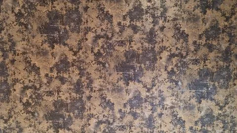 Pattern of brown and gray design with textured look on a wall surface in in.. Stock Photos