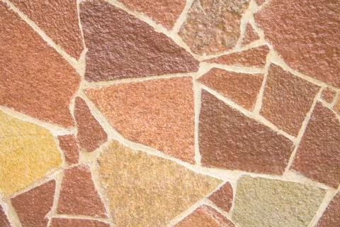 A pattern of brown decorative tiles of different colors for background. Stock Photos