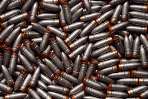 Pattern of bullet. Many lead bullets with copper bottom Stock Photos
