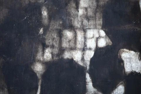 Pattern on a burned wall, texture Stock Photos