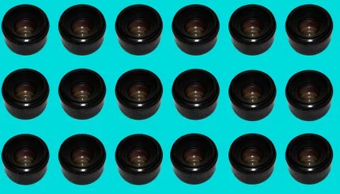 Pattern with camera lenses on a blue background. Foto stock