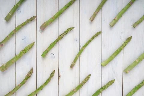 Pattern of carrots. Top view of veggies on white wooden background. fresh and Фото