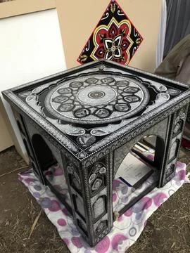 Pattern carved on black stone table Stock Photos