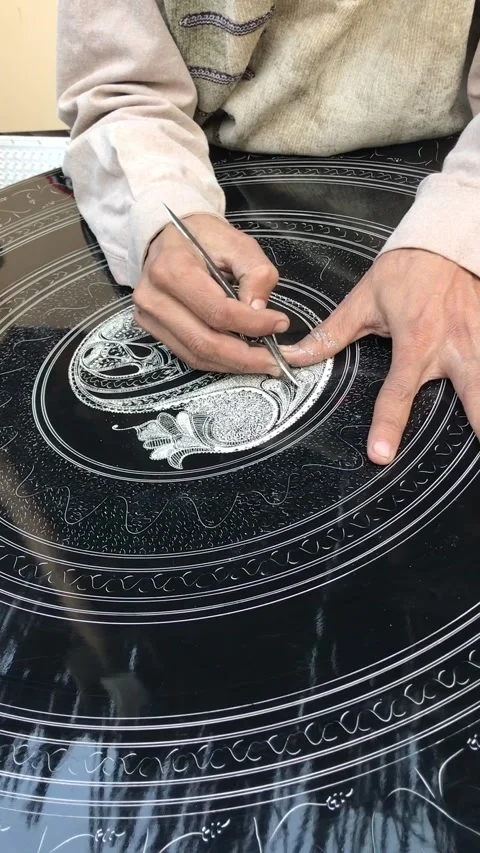 Pattern carving on black stones Stock Footage 222951631