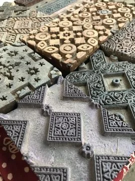 Pattern carving on black stones Stock Photos