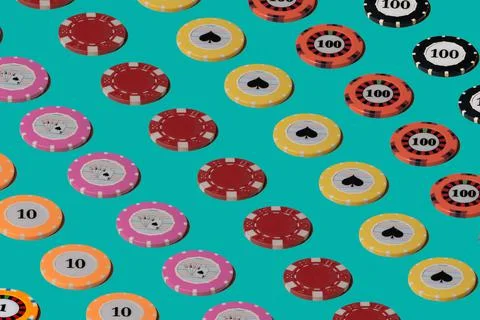 Pattern from casino chips on a green screen chroma key. Rows of casino chips for Stock Photos