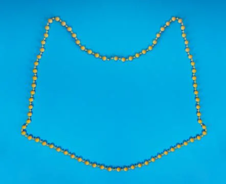 Pattern of a cat's head made of beads. Stock Photos
