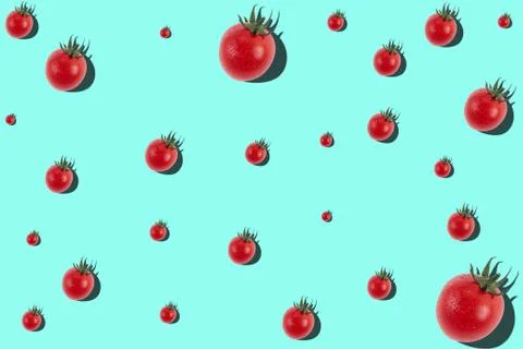 Pattern of cherry tomatoes on light blue background Stock Photos