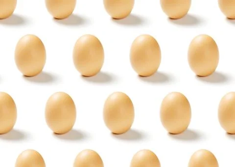 Pattern of chicken eggs isolated on white background Stock Photos