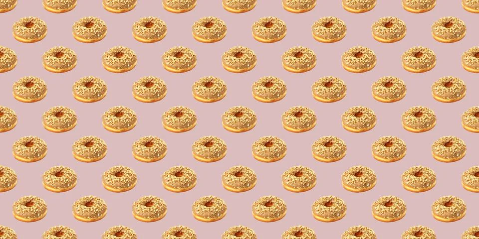 Pattern from chocolate donuts on a beige background. Chocolate donuts pattern Stock Photos