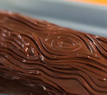 Pattern in chocolate icing Stock Photos