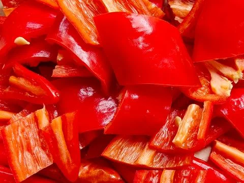 Pattern of Chopped Red Chili Peppers and Bell Peppers Background Stock Photos