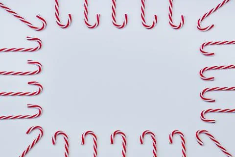 Pattern of christmas candy canes on a white background Stock Photos