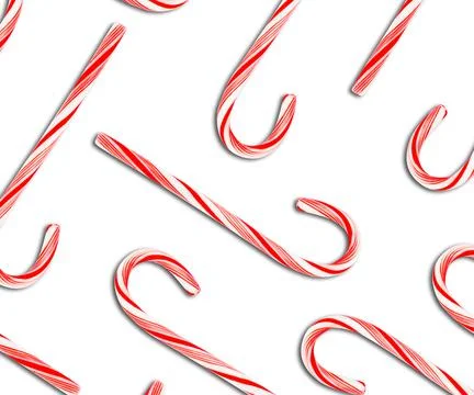 Pattern of Christmas candy canes on white background, top view Stock Photos