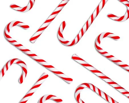 Pattern of Christmas candy canes on white background, top view Stock Photos