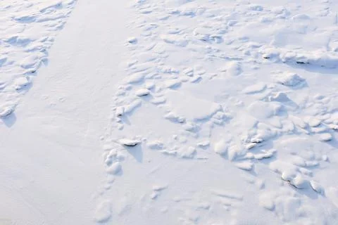 Pattern of clean white textured snow on a cold winter day Stock Photos