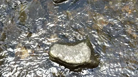 Pattern of clear water flow in the rock 2 Stock Footage 208525286