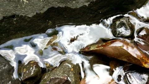 Pattern of clear water flow in the rock 36 Stock Footage 208543603