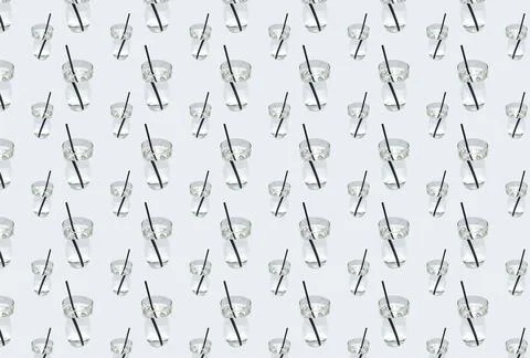 A pattern with clear water in a glass with a drinking straw on a gray backgro Stock Illustration