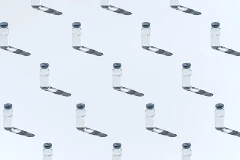 Pattern from close up glass vial with flu vaccine and syringe with needle Stock Photos