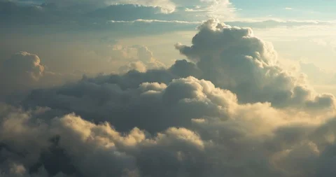 Pattern of clouds filling a blue sky above treetops on a sunny summer day Stock Footage 91312994