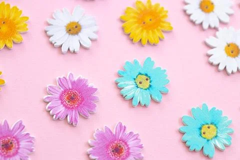 Pattern of colored flowers on pink background Stock Photos