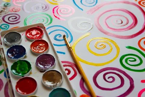 Pattern of colored painted spirals, background from watercolor paints and gou 写真素材