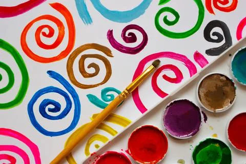Pattern of colored painted spirals, background from watercolor paints and gou Stock Photos