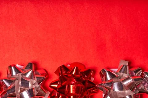 Pattern of colored stars on a red background. New year background concept Stock Photos