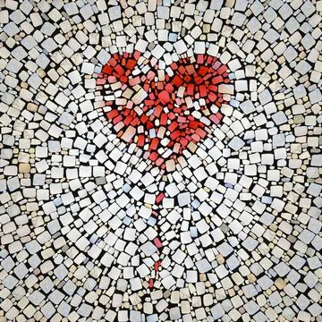 Pattern of colored stones or tiles on the path with red heart for design Illustrazione stock