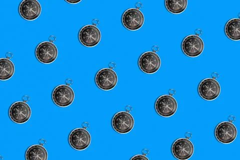 Pattern of compass. Trendy background of compass on a blue background. Colorf Stock Photos