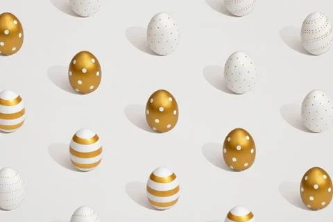 Pattern composition of golden eggs on a white background. Minimal easter co.. Stock Photos