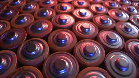 Pattern consisting of alkaline batteries. The camera moves from above. Close-up. Stock Footage 162372538