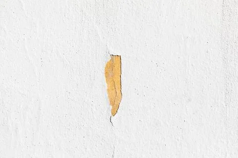 Pattern of cracked white painted structured plaster wall Stock Photos