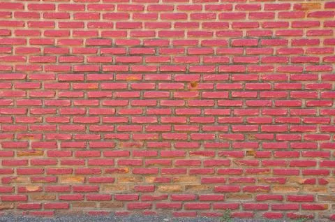 Pattern of crimson red wall of bricks background Foto stock