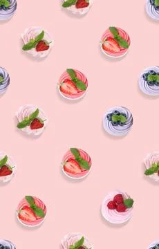 Pattern of cupcakes with berries on pink background, top view Stock Photos