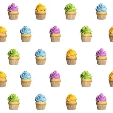 Pattern of cupcakes with bright cream on white background Stock Photos