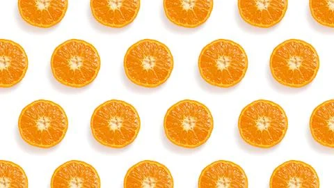 Pattern of cut tangerines on a white background Stock Photos