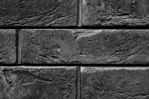 Pattern of decorative black slate stone wall surface as a background Foto stock