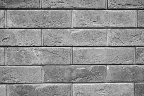 Pattern of decorative gray slate stone wall surface as a background. tinted g Stock Photos