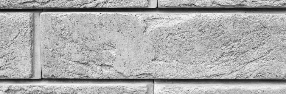 Pattern of decorative gray slate stone wall surface as a background. tinted g Stock Photos