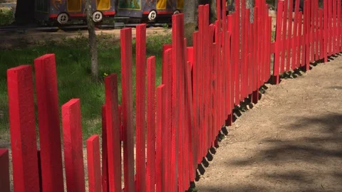 A pattern of the decorative, red plank fence. Stock Footage 108506283