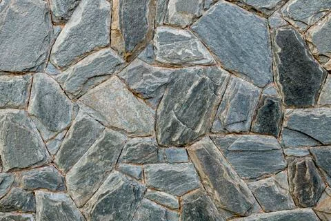 Pattern of decorative stone wall background Stock Photos