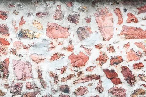Pattern  decorative uneven cracked real stone wall surface with cement,for .. Foto stock