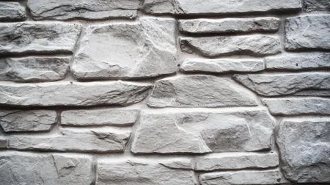 Pattern of decorative white slate stone wall surface Stock Photos
