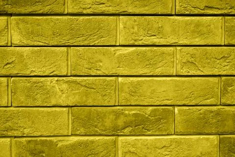 Pattern of decorative yellow gray slate stone wall surface as a background. t Stock Photos