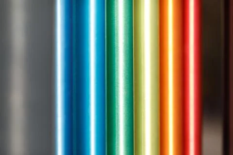 Pattern of different colored iron pipe. background Stock Photos