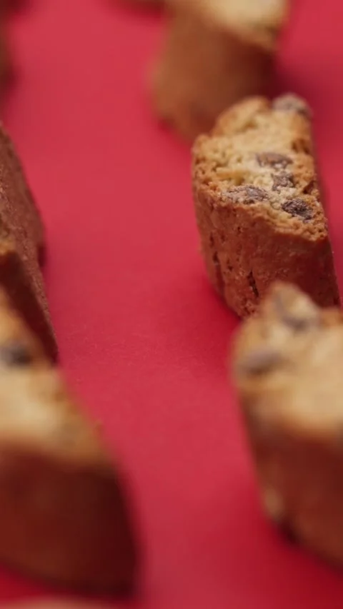 A pattern of different cookies laid out on a red background Stock Footage 171741722